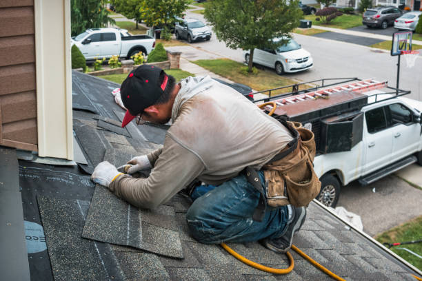 Professional Roofing technician working in Braintree, MA